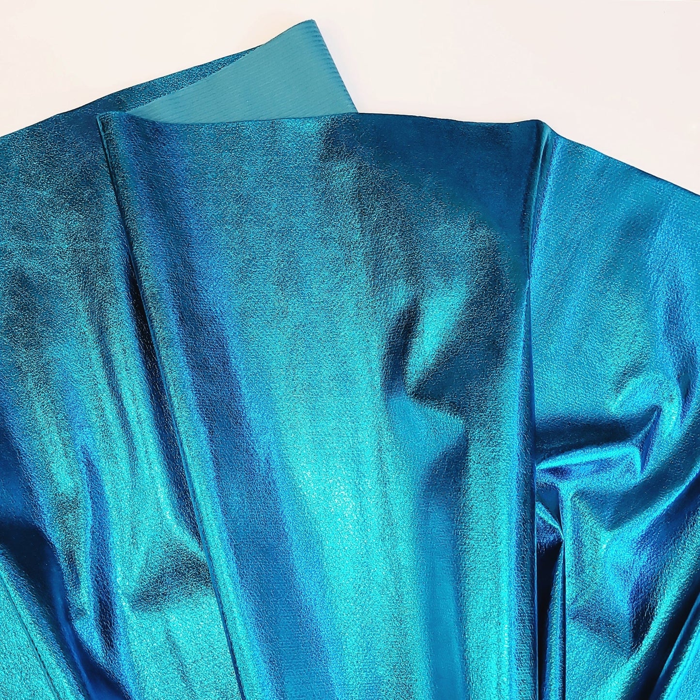 Blue metallic fabric.