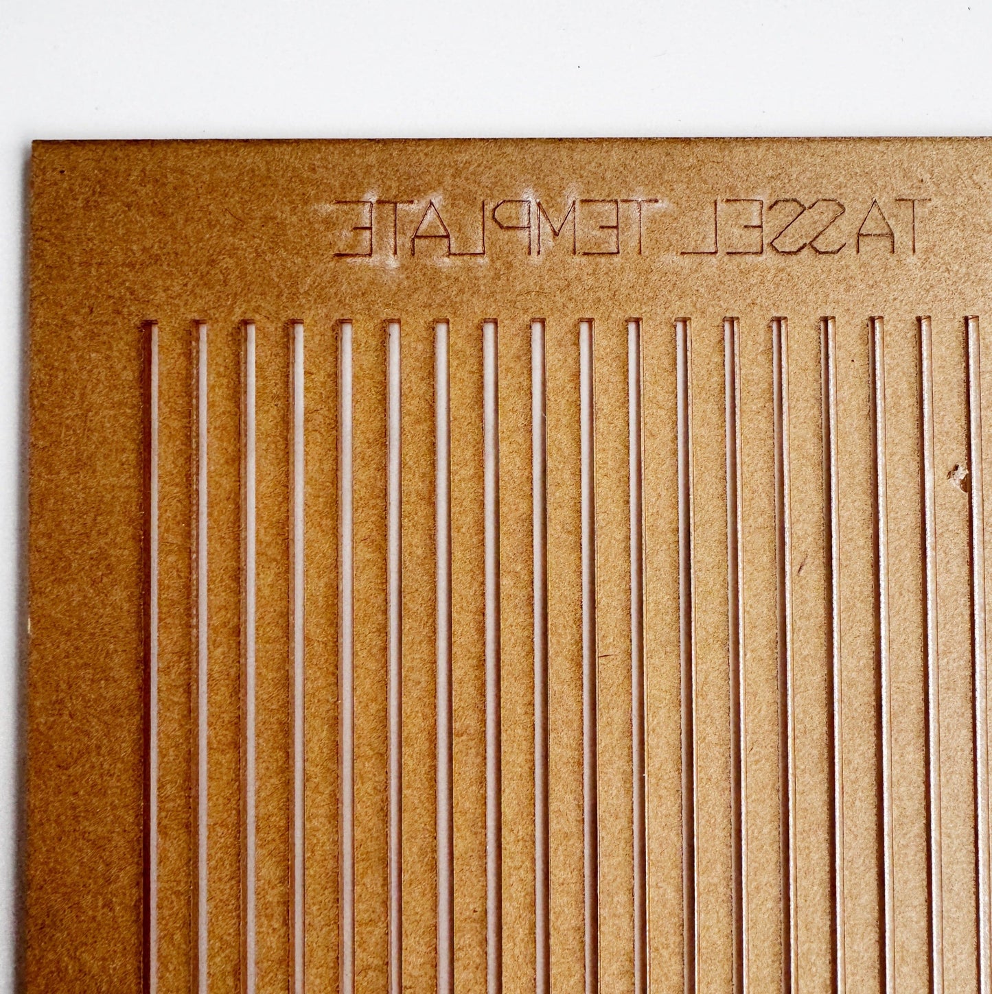 Tassel template 26011A8F-BB20-4EC3-A436-20F66E20B058, brown with vertical lines.