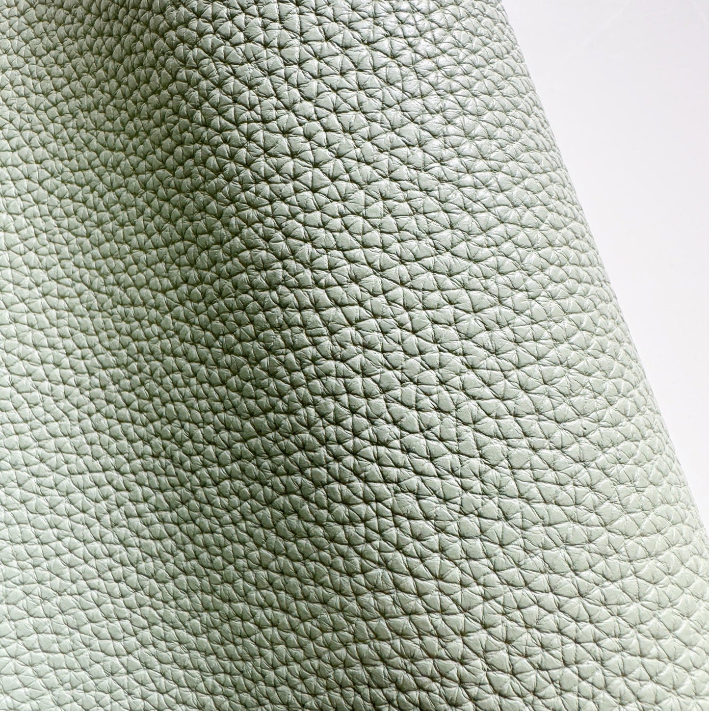 Green textured leather swatch