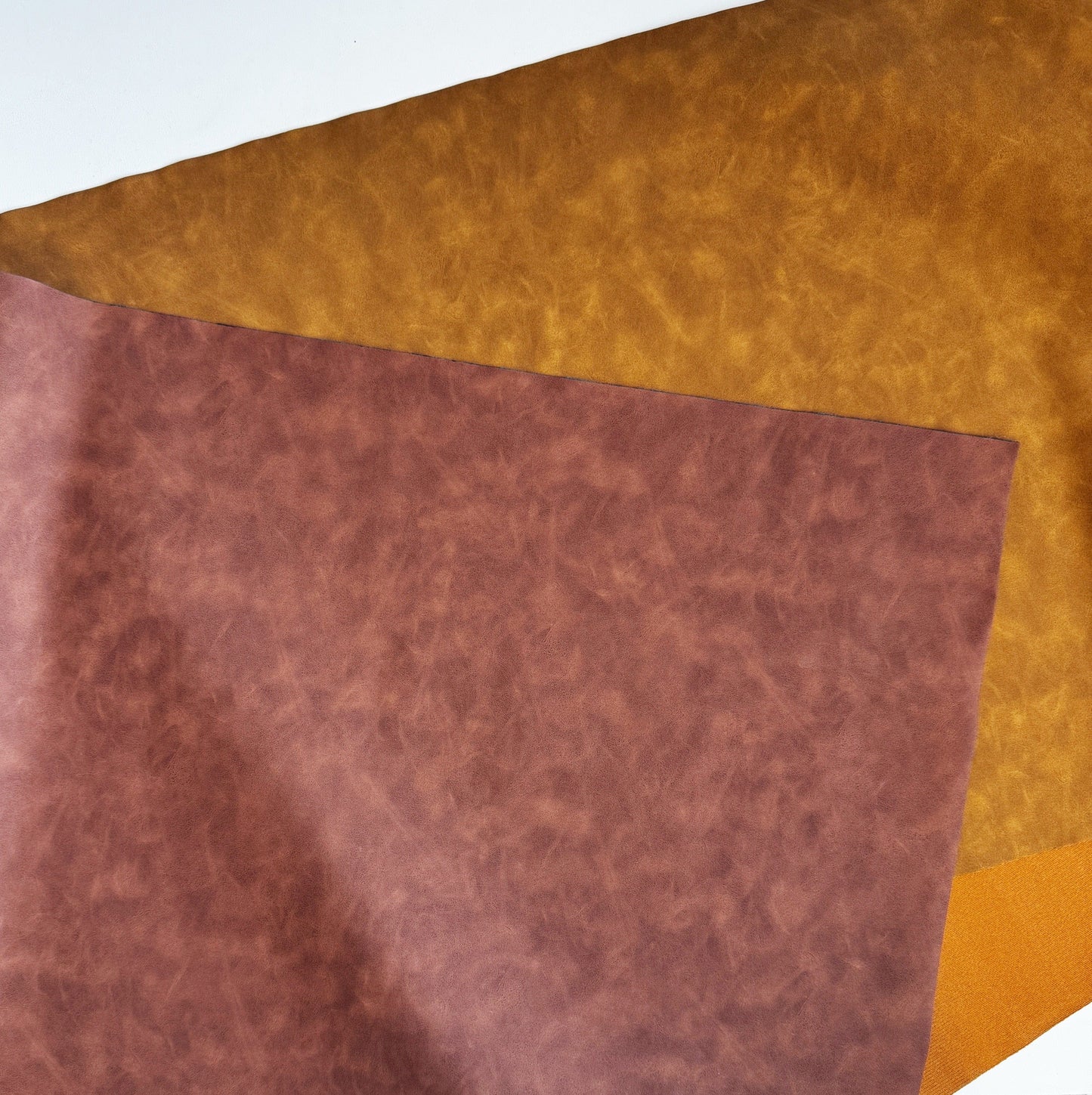 Textured fabric swatch in brown and orange