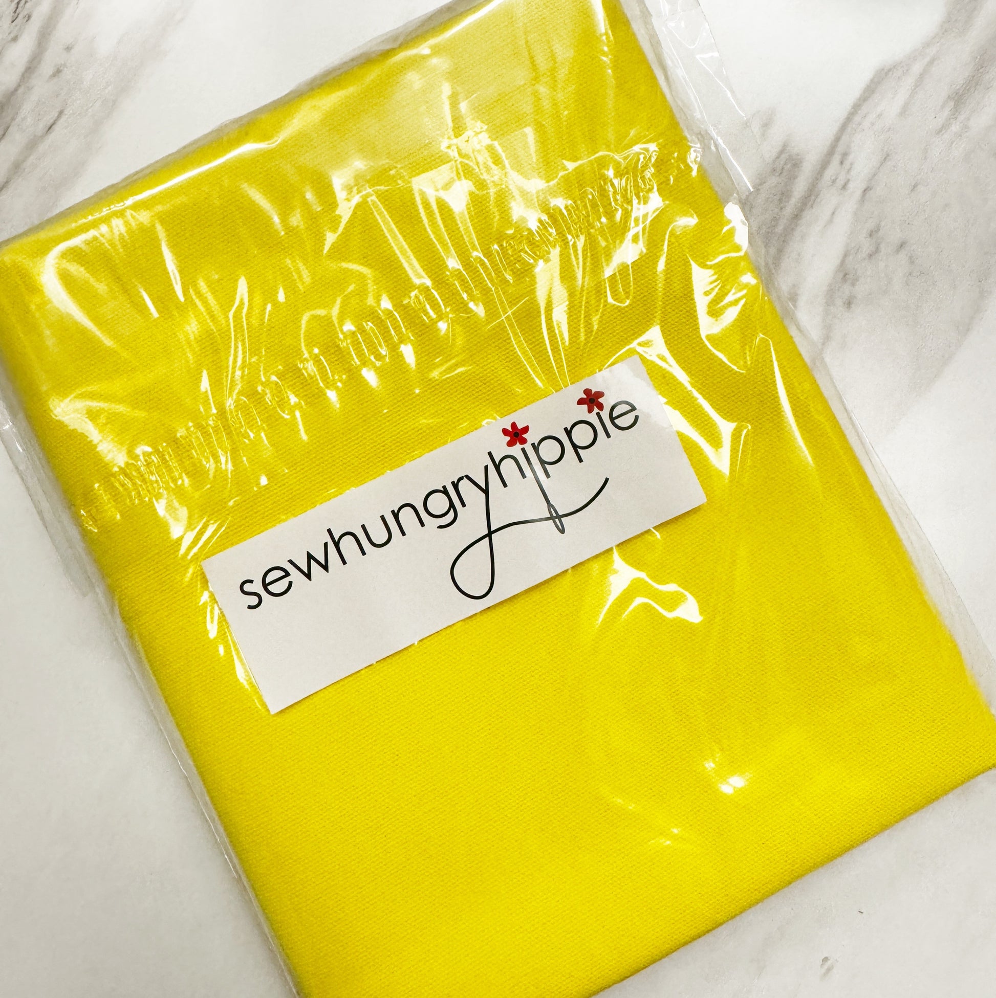 Sew Hungry Hippie yellow fabric in plastic - 354CA055-AFFF