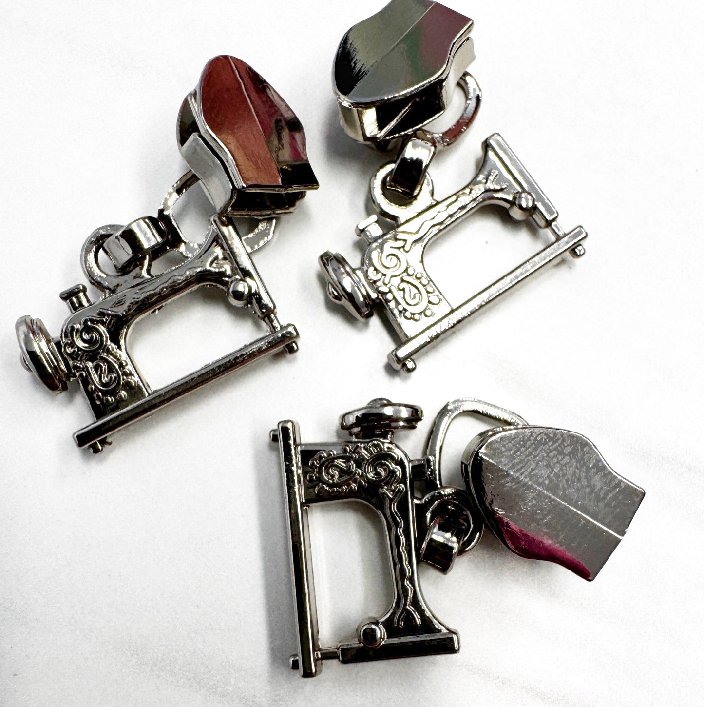 Sewing machine zipper pulls - 3CCD4F7F