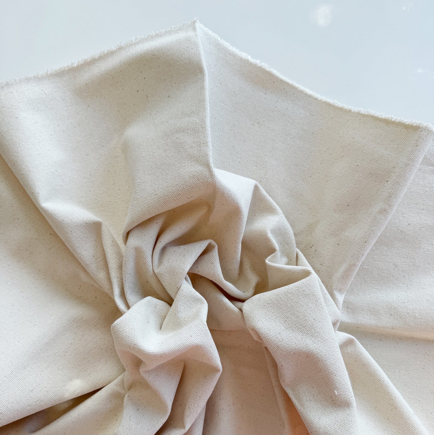 Folded beige fabric detail - 5561CDE9