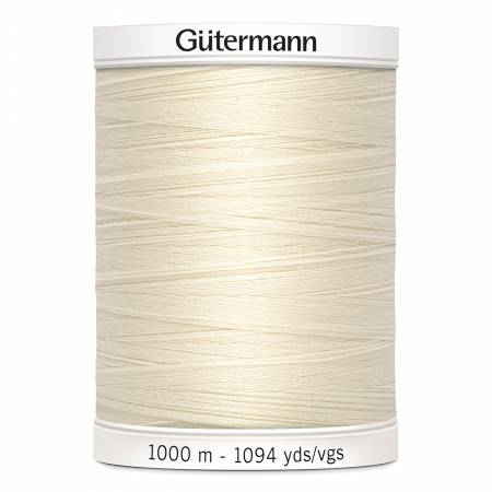Spool of off-white Gütermann thread.