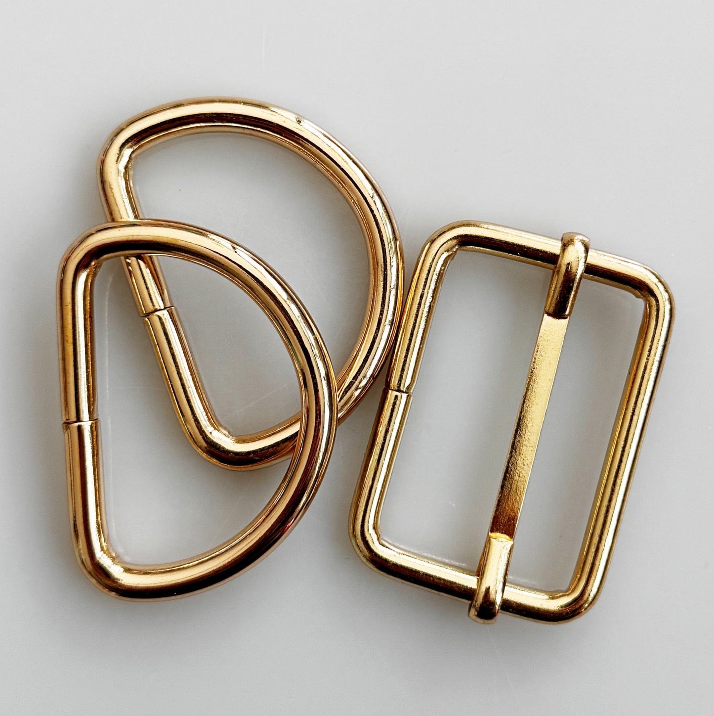 Gold metal rings and buckle (8AB9C87B-2C04)