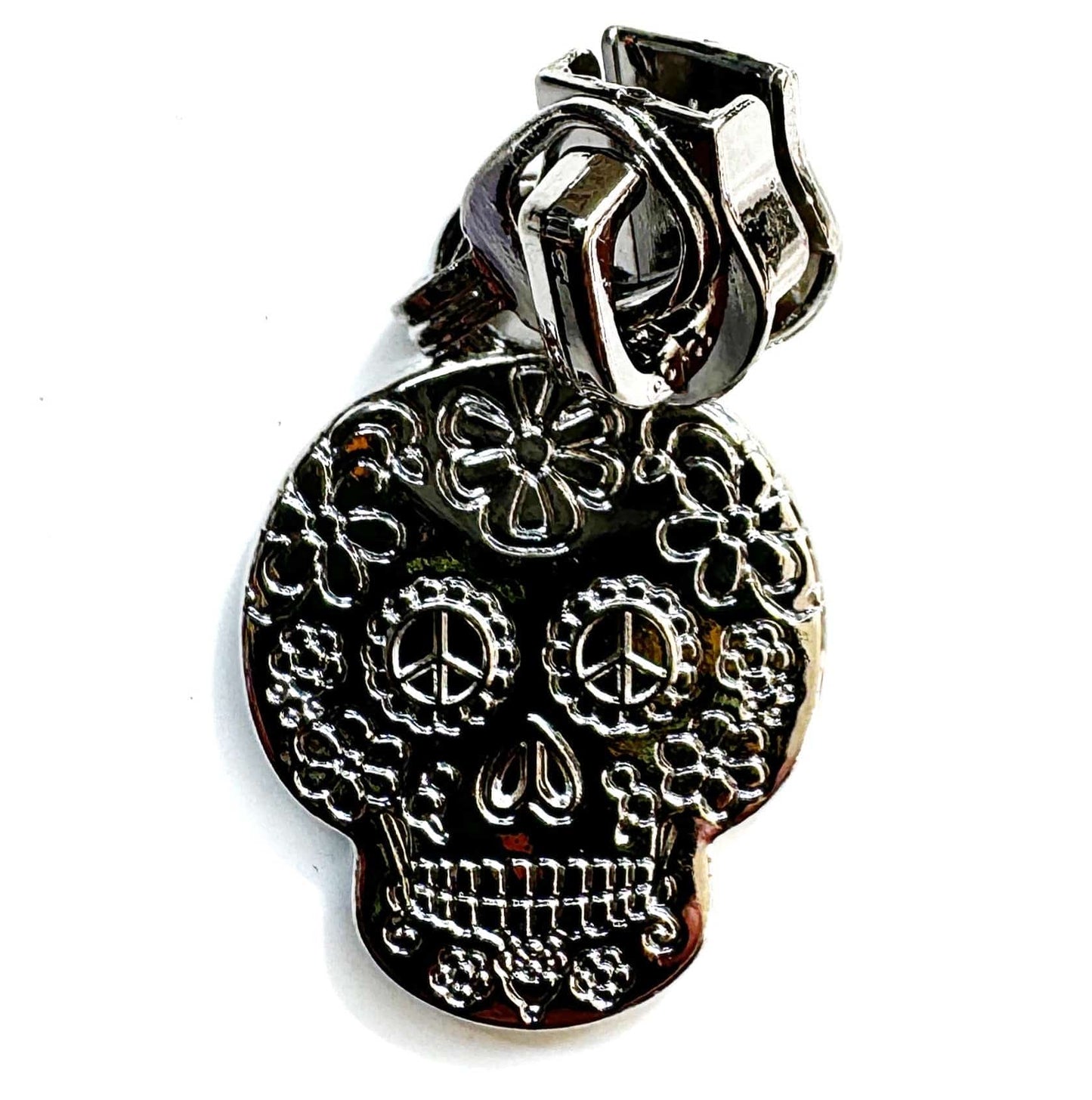 Skull zipper pull with floral design