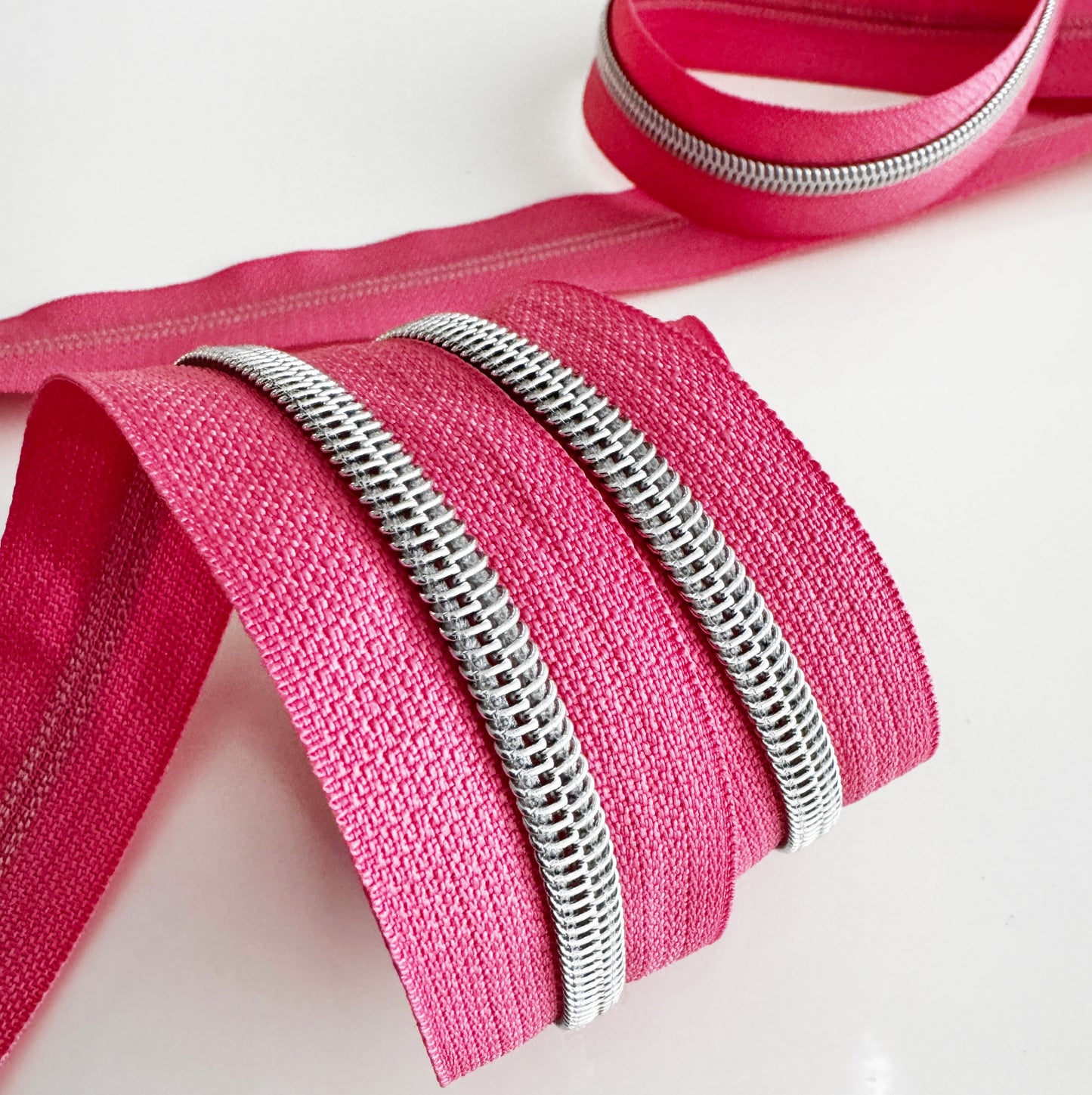 Pink zipper detail, C5F514A5-15F4-4AB1-9C1C-364B70C75ECD