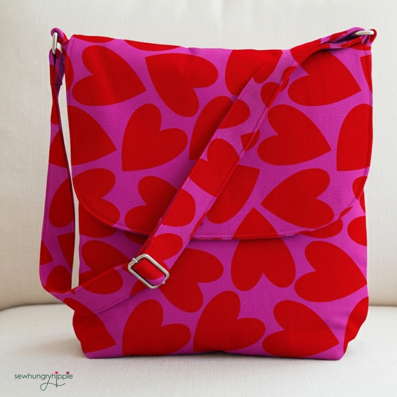 Red heart-patterned bag on a light background