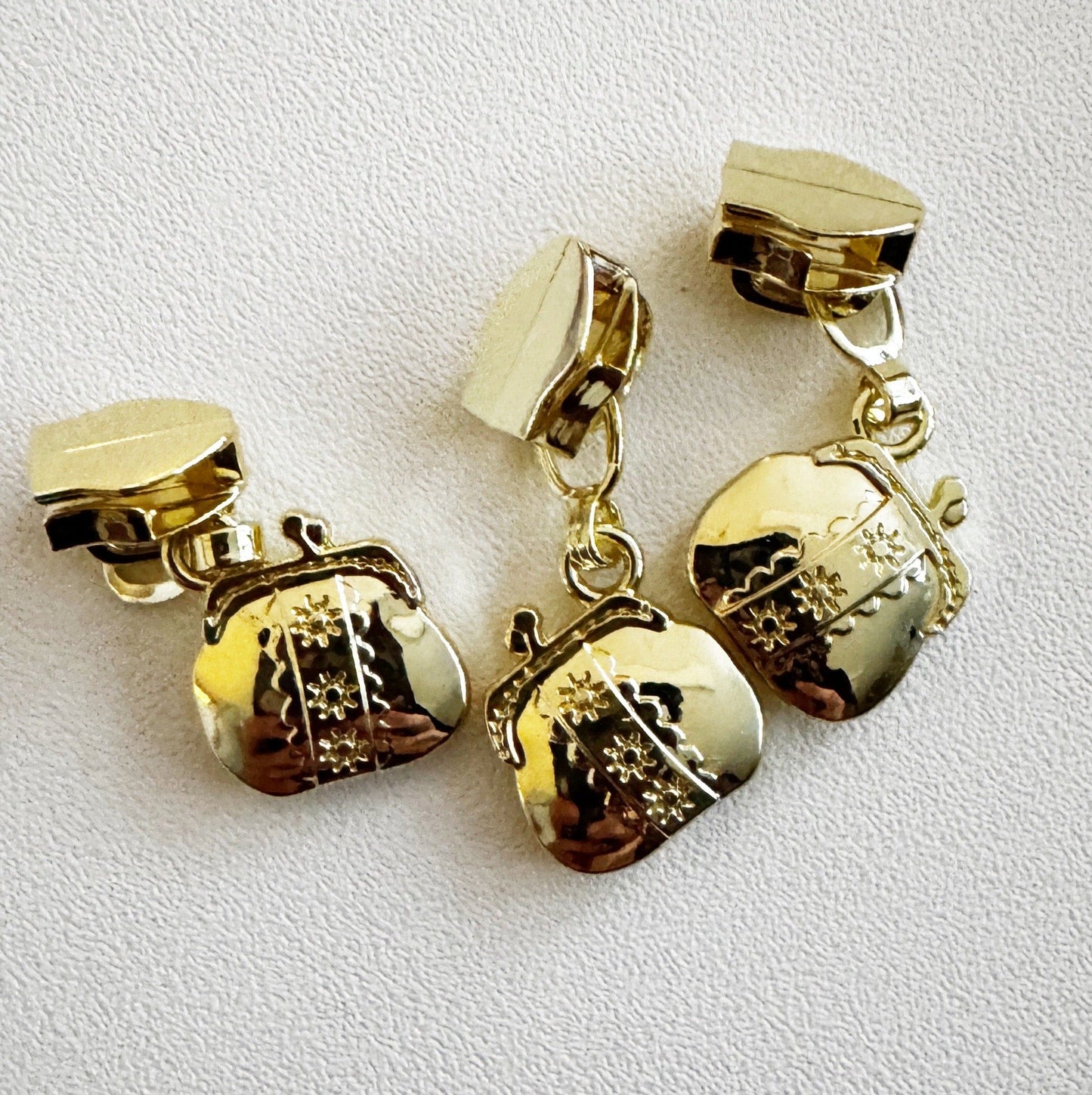 Gold purse zipper pulls
