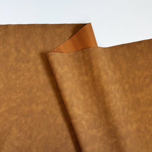 Brown leather fabric, detail view, E600B887-46BB-482B-B1E5-8114C9FE4366