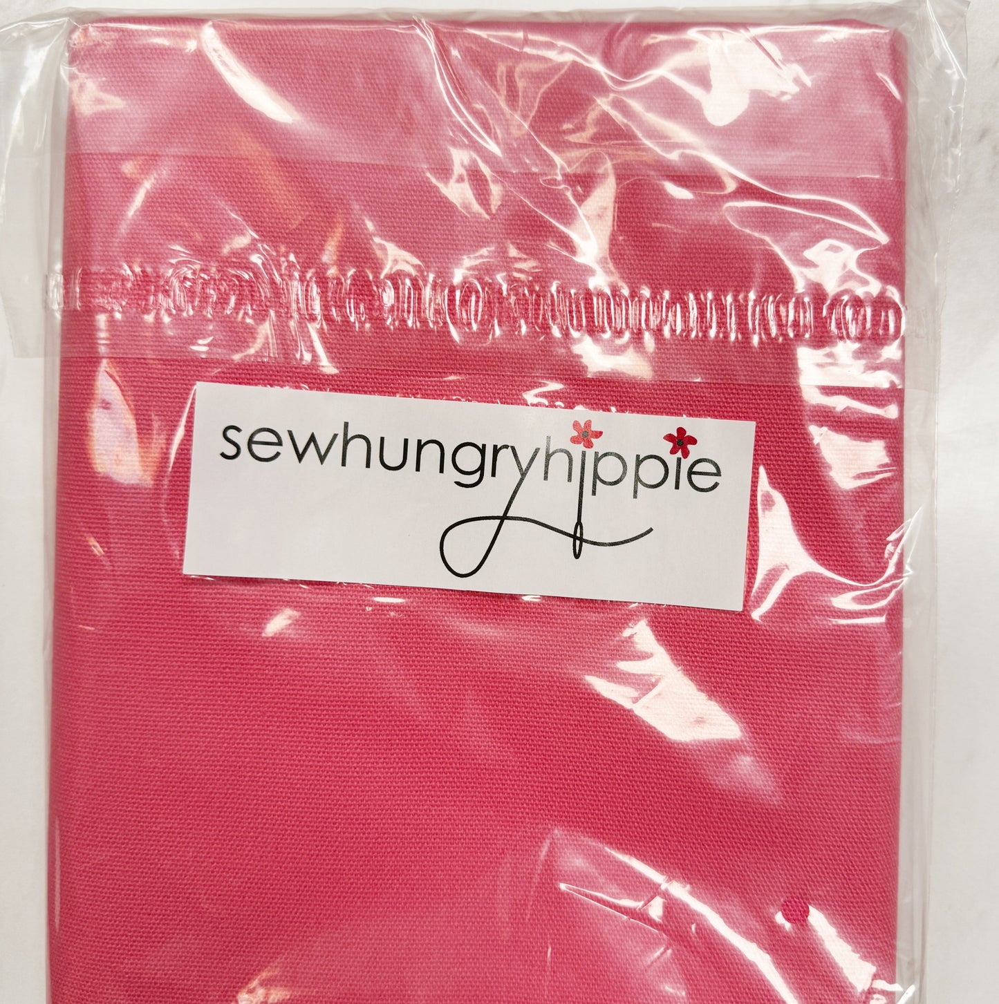 Sew Hungry Hippie pink fabric product in packaging