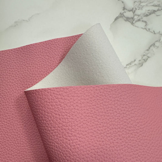 Pink textured fabric sample