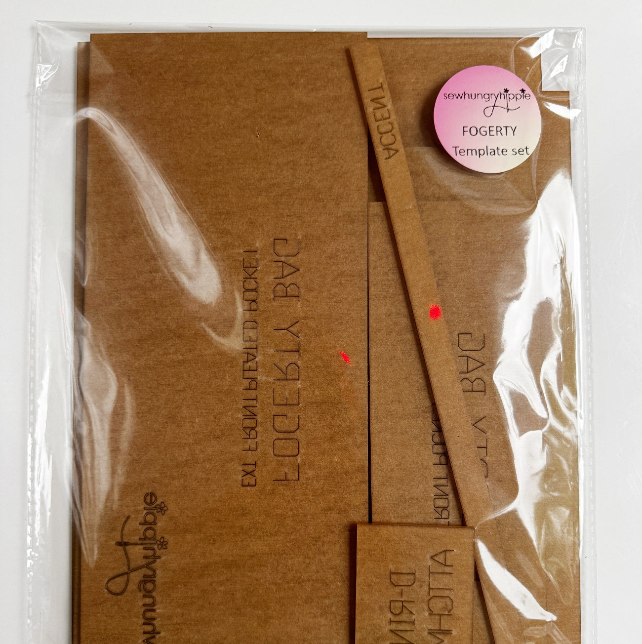 Sew Hungry Hippie Fogerty Bag template set packaged in clear sleeve for bag making sewing patterns.