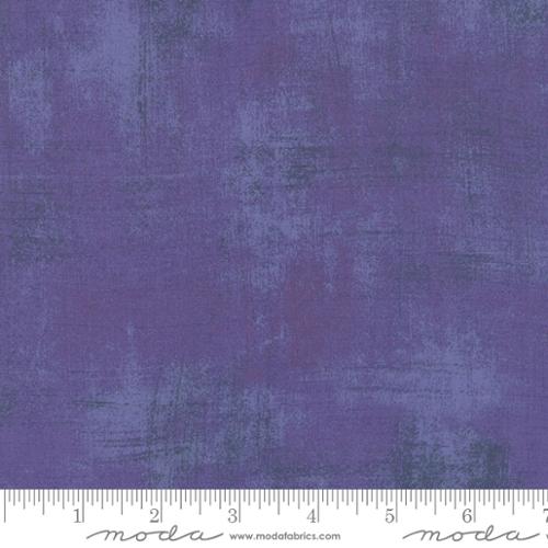 Hyacinth fabric with textured purple surface.