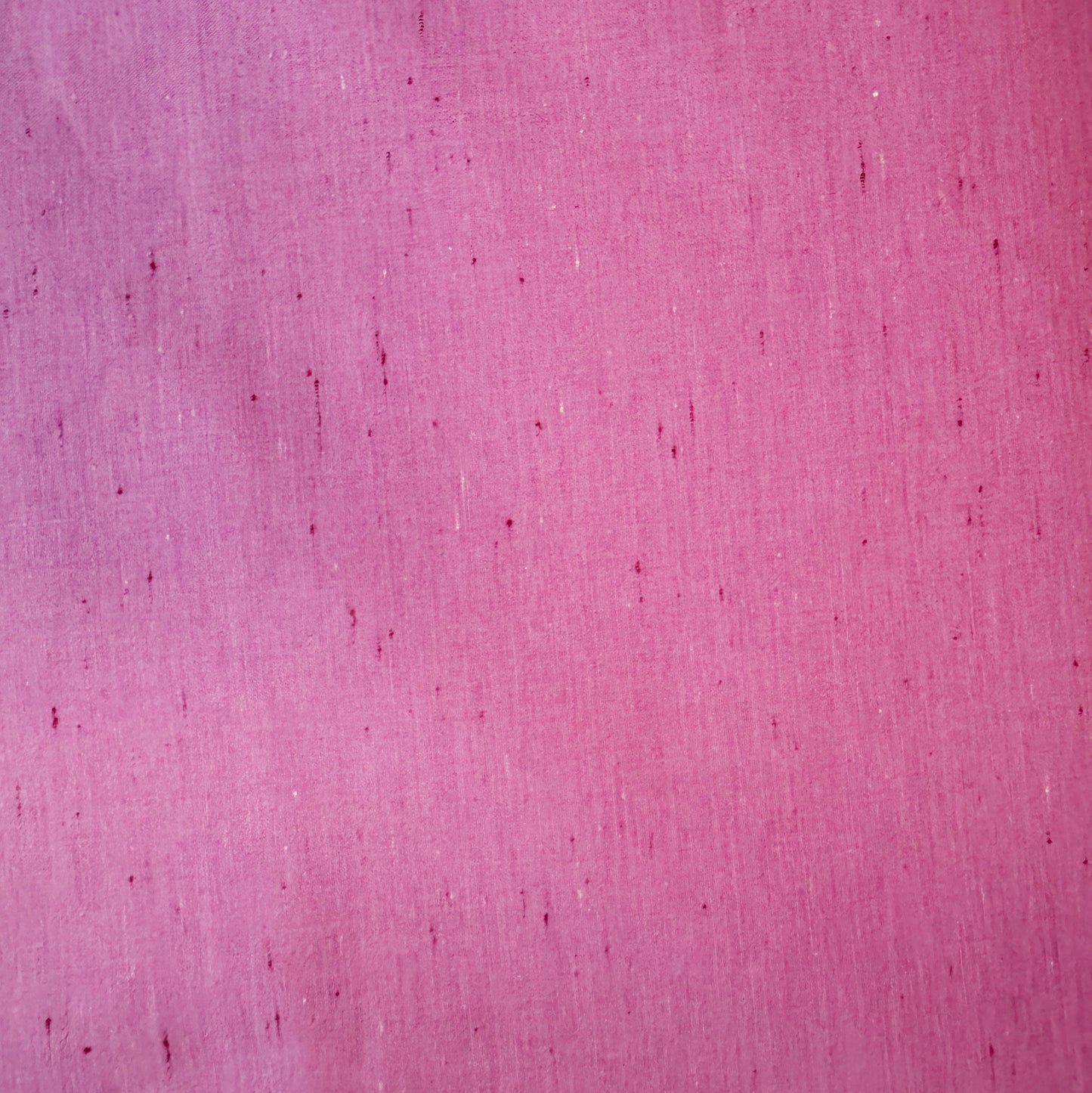 Speckled in Bubblegum yarn-dyed woven 100% cotton fabric with textured pink specks for sewing and quilting.