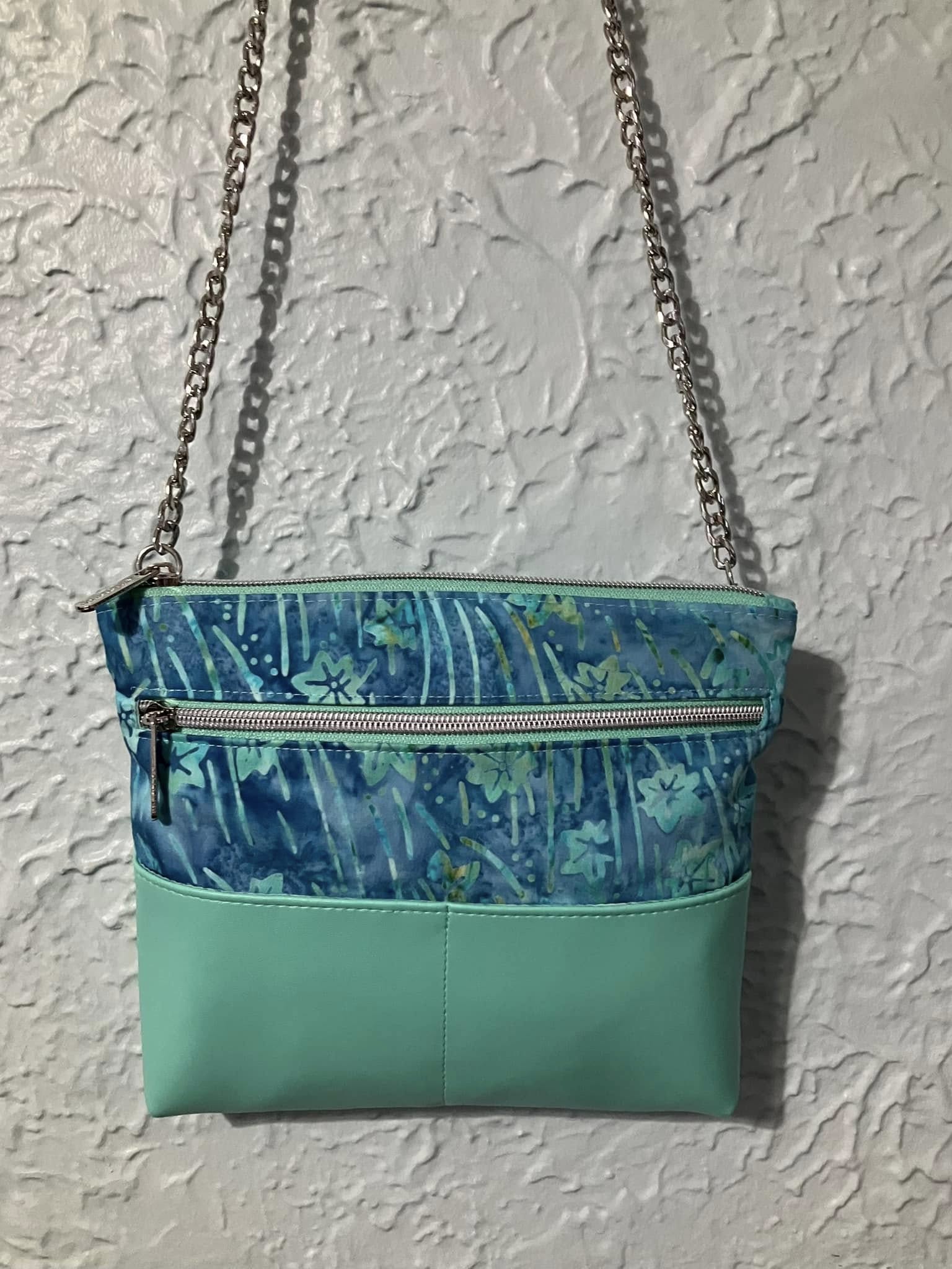 Patti Roth crossbody bag with teal and blue pattern