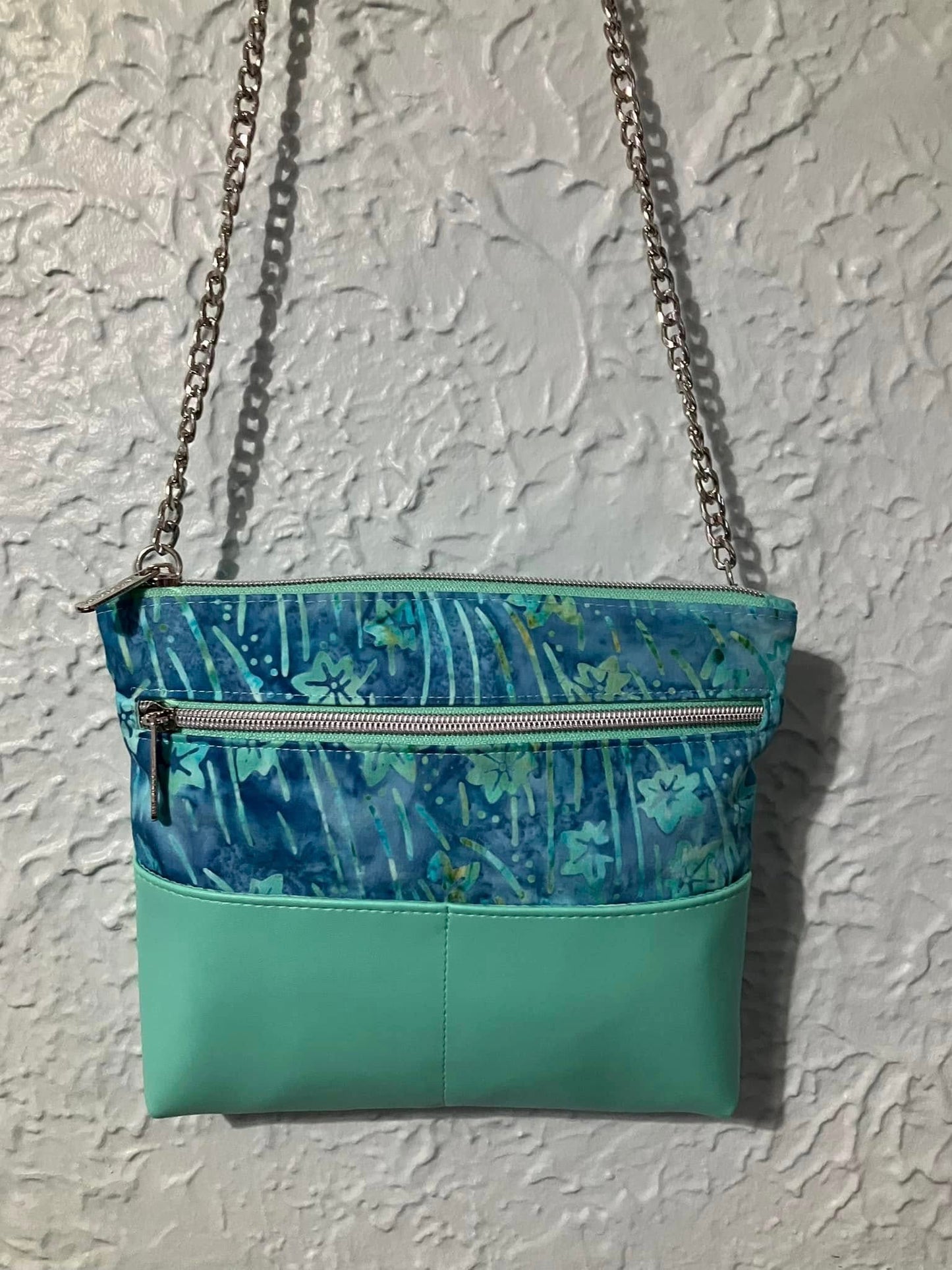 Patti Roth crossbody bag with teal and blue pattern