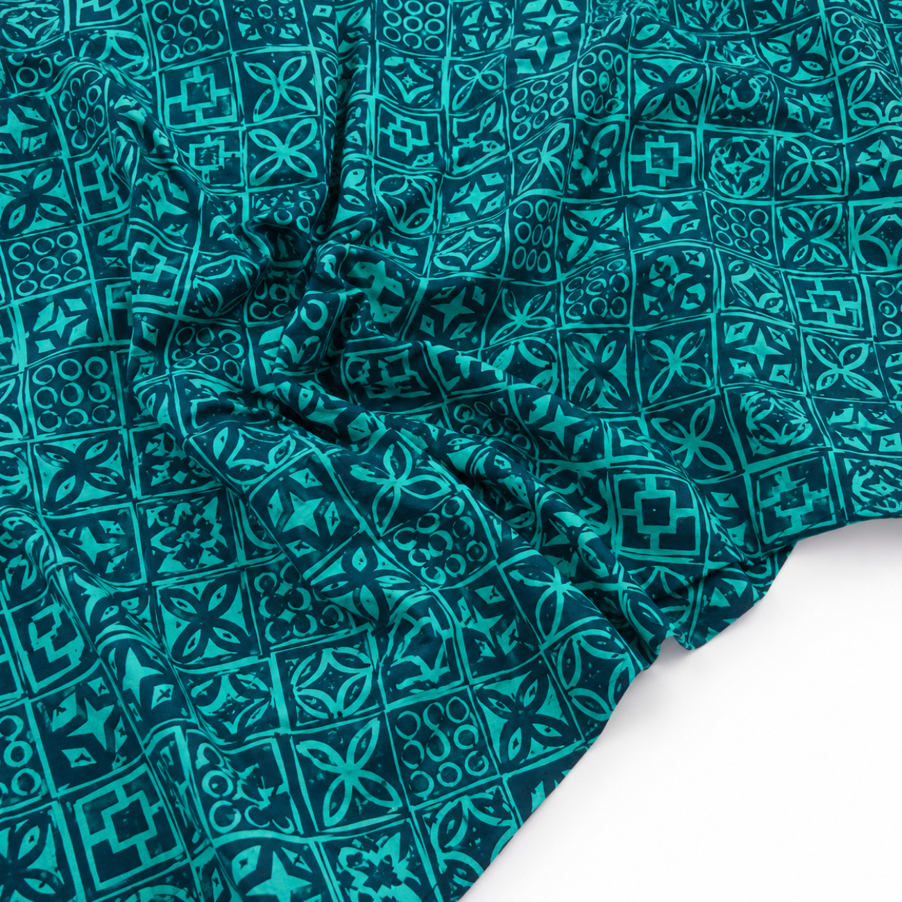 A vibrant teal and peacock blue quilting fabric from the Ruby Star Society Poolside Too collection. The design features a geometric "Architectural Blocks" pattern with hand-stamped style motifs including circles, petals, and squares in a grid layout.