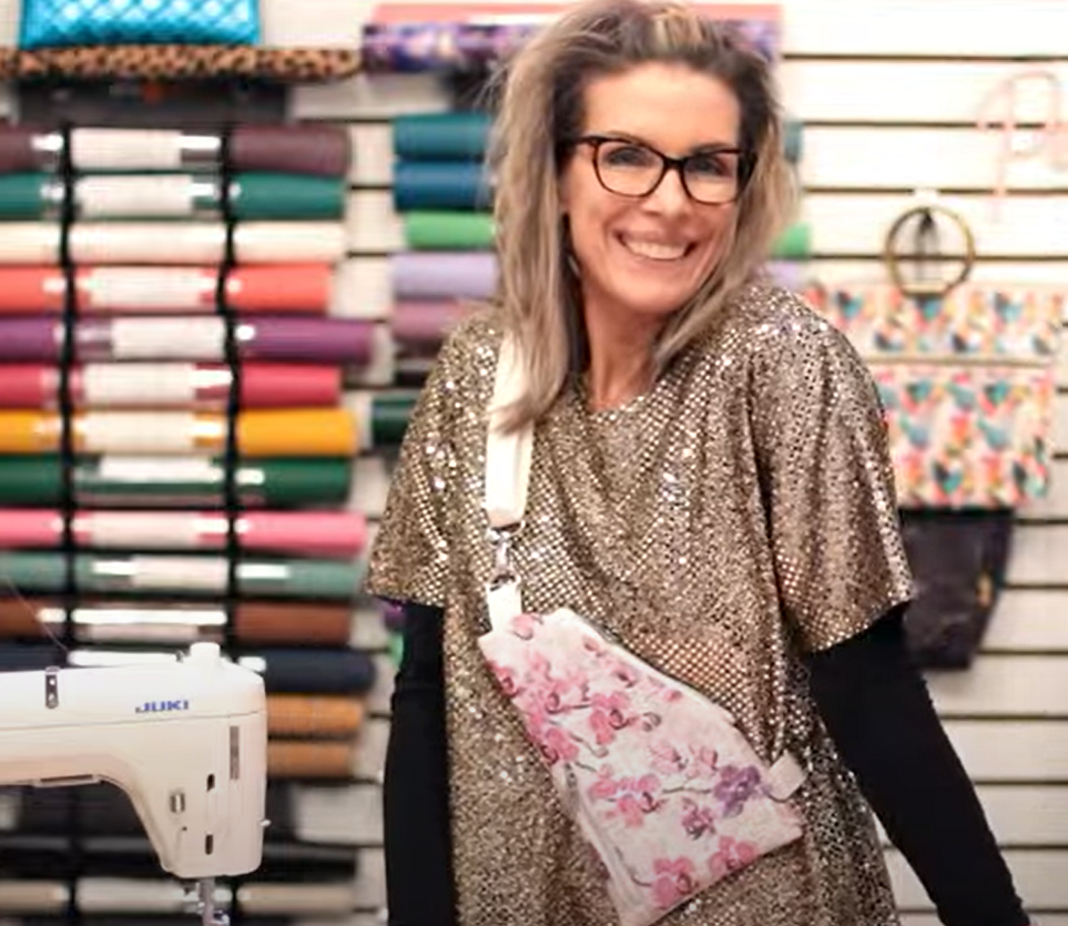 Woman with floral adventure sling bag