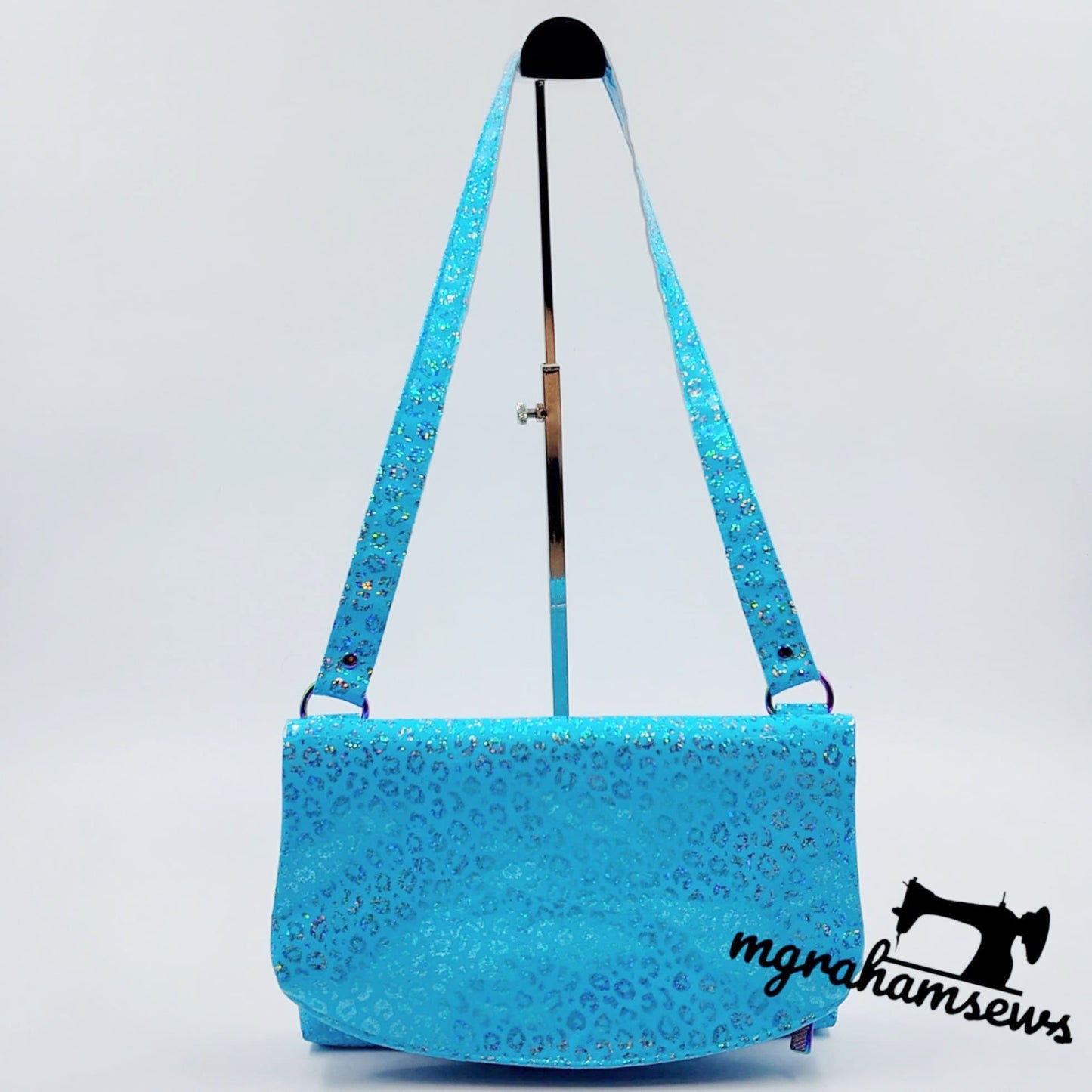 Carly clutch bag sewing pattern, blue leopard print bag