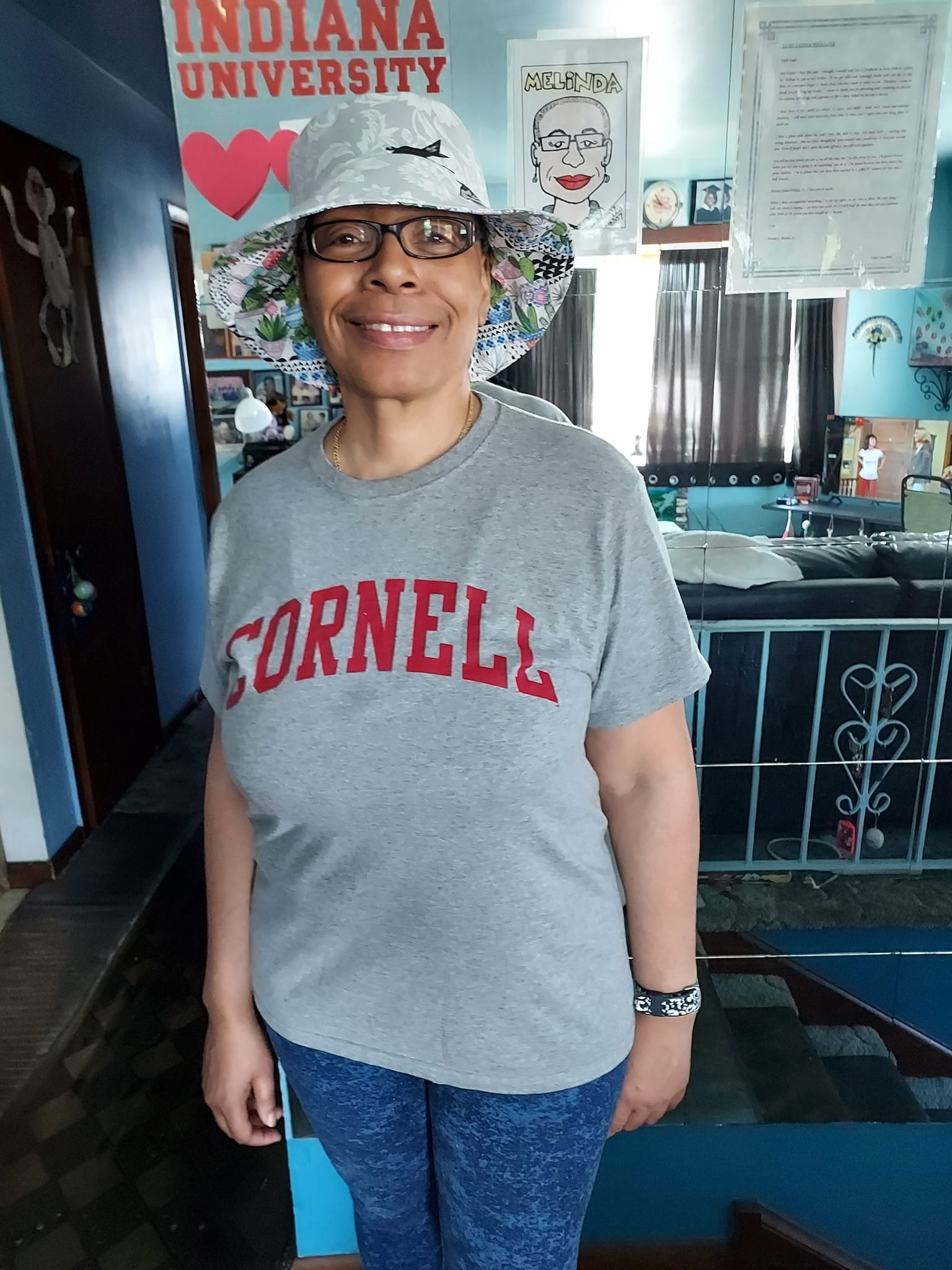 Woman in Cornell t-shirt and hat - clovis4
