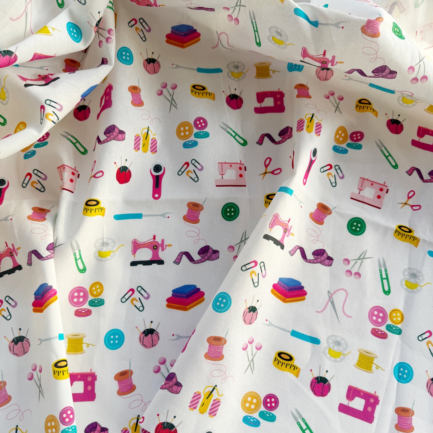 Fabric with sewing tools pattern