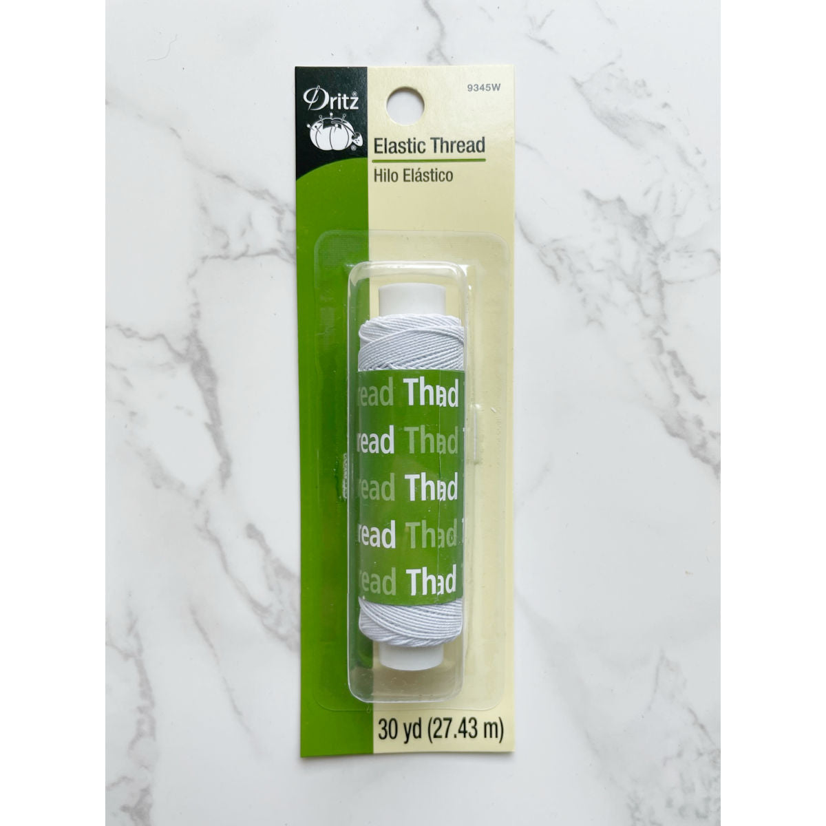 White elastic thread spool by Dritz