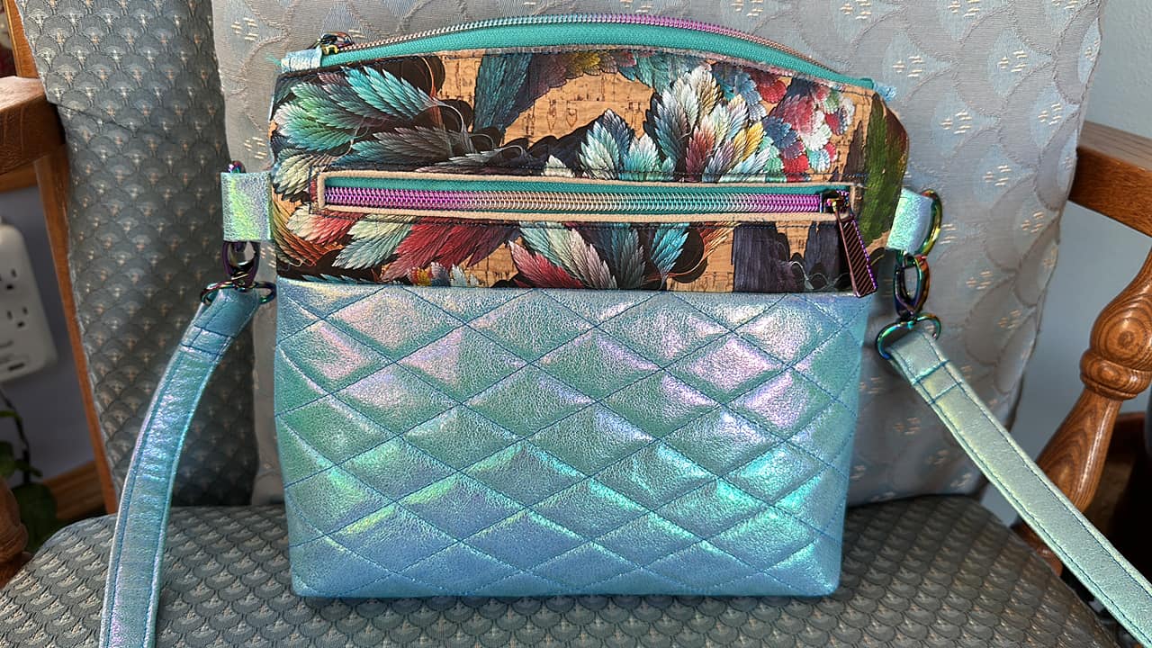 Patricia's colorful floral and iridescent quilted crossbody bag