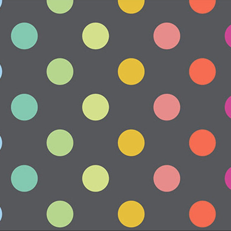 Pattern of colorful polka dots on a dark gray background