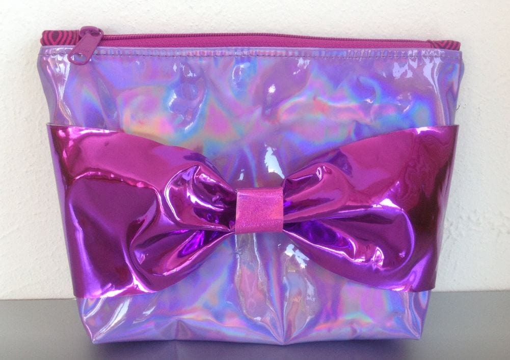 ElizBolton iridescent bow cosmetic bag