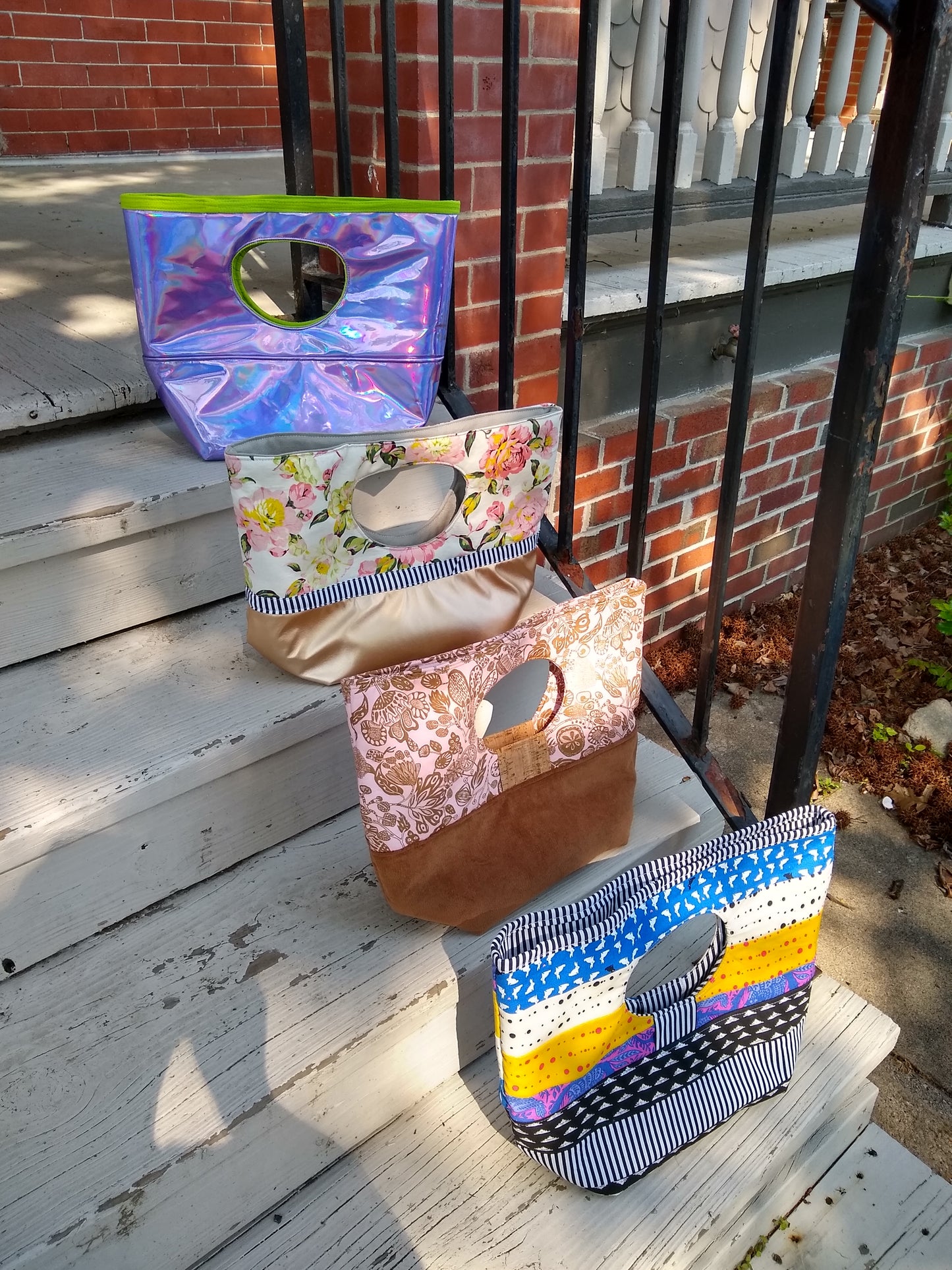 Handmade purses on porch steps, May 2020