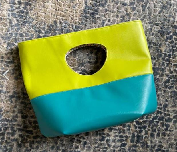 Aimee's neon green and blue clutch