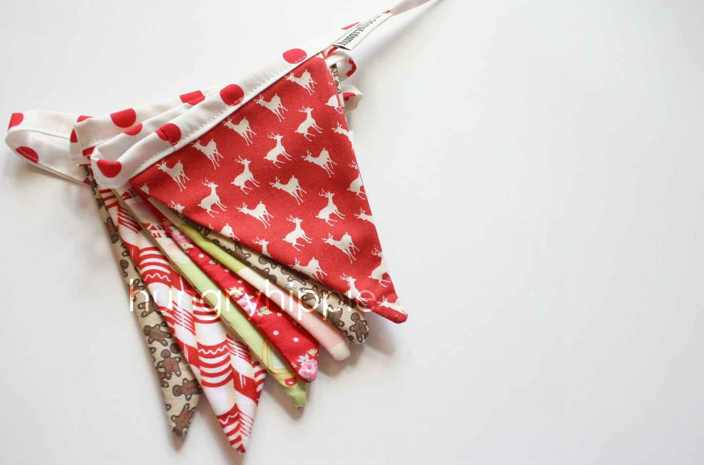 Christmas banner with red and white patterned flags