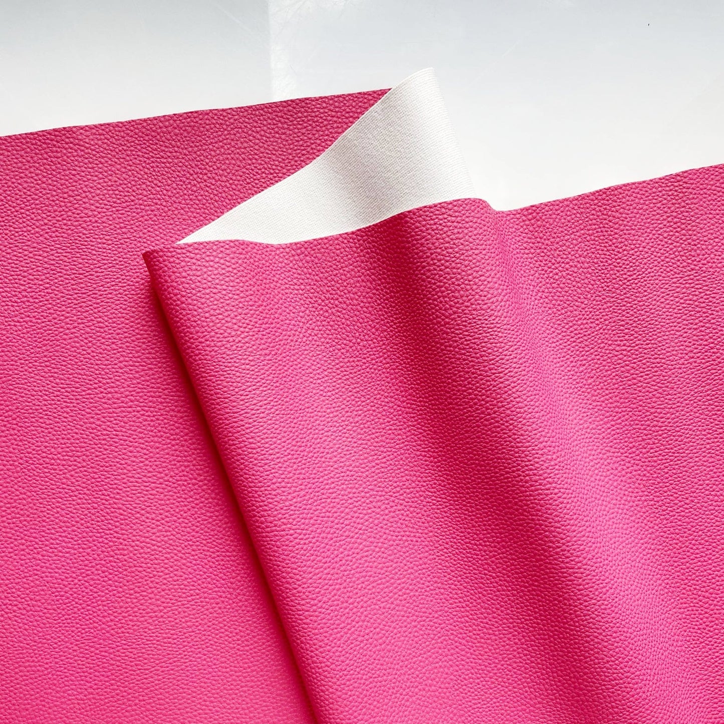 Berry pink faux leather vinyl fabric