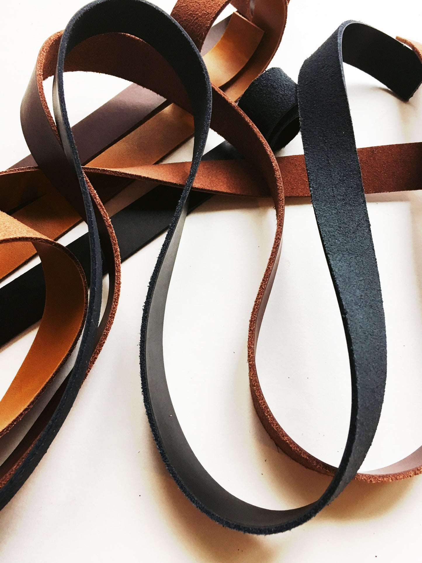 Black leather straps and brown leather strips