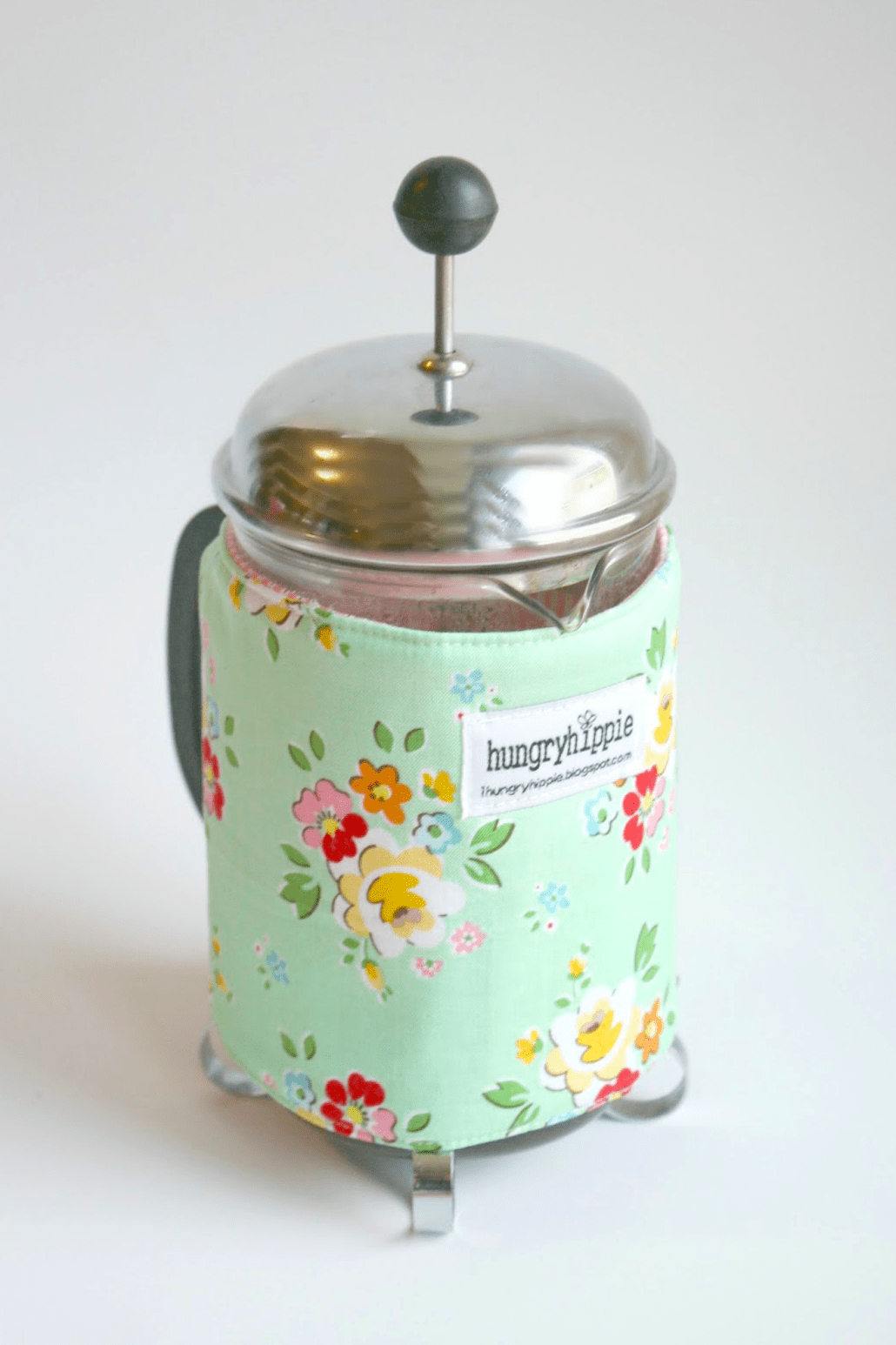 Santini coffee press sleeve with floral design