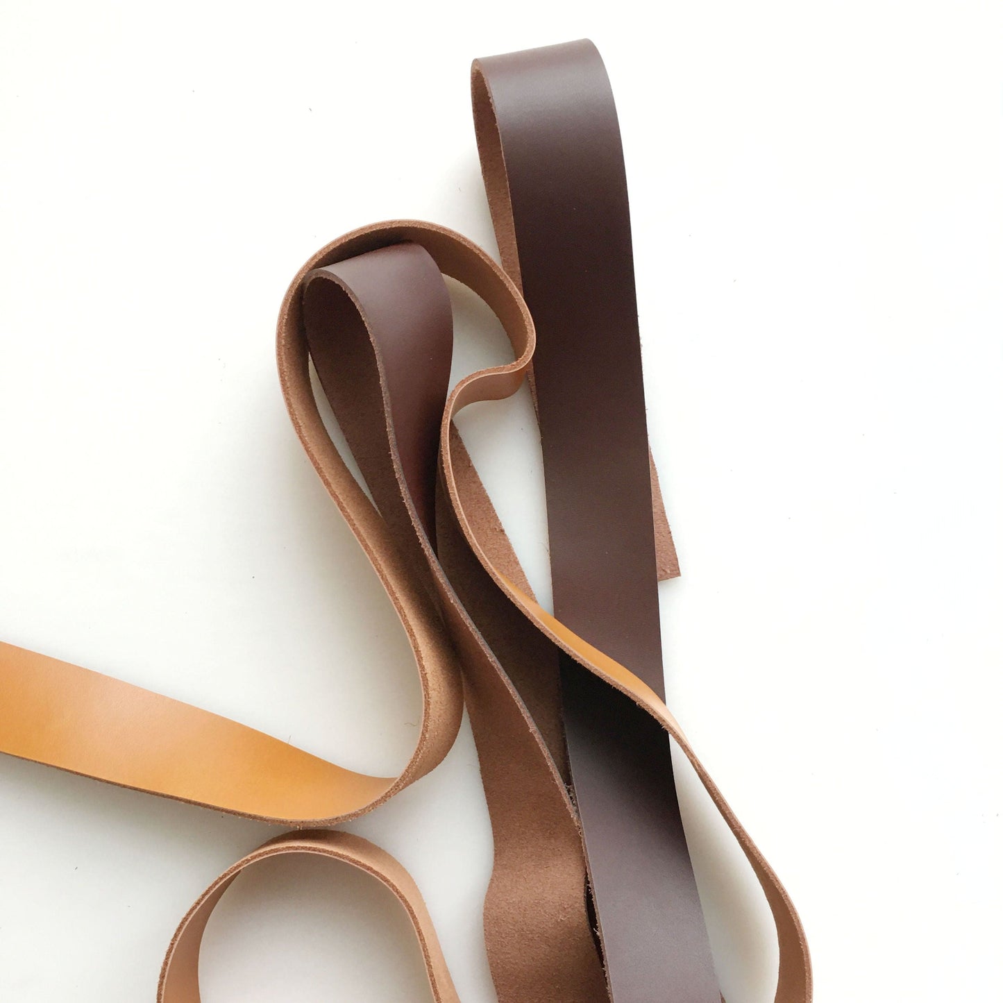 Leather strips in various shades of brown.