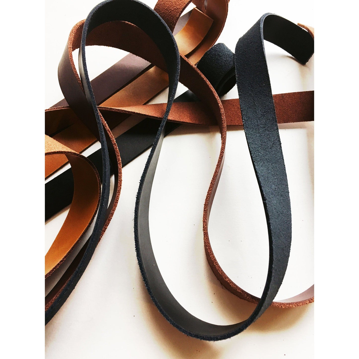 Leather straps in brown and black