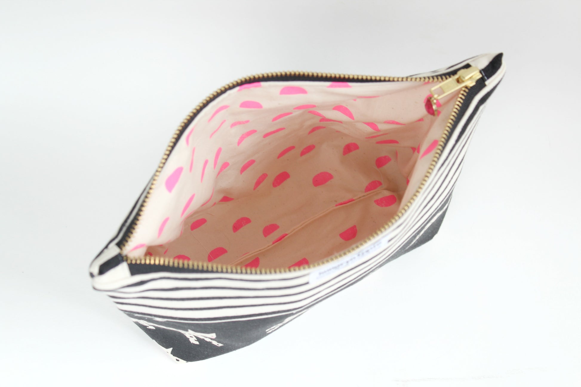 Kitty pouch interior with pink polka dots
