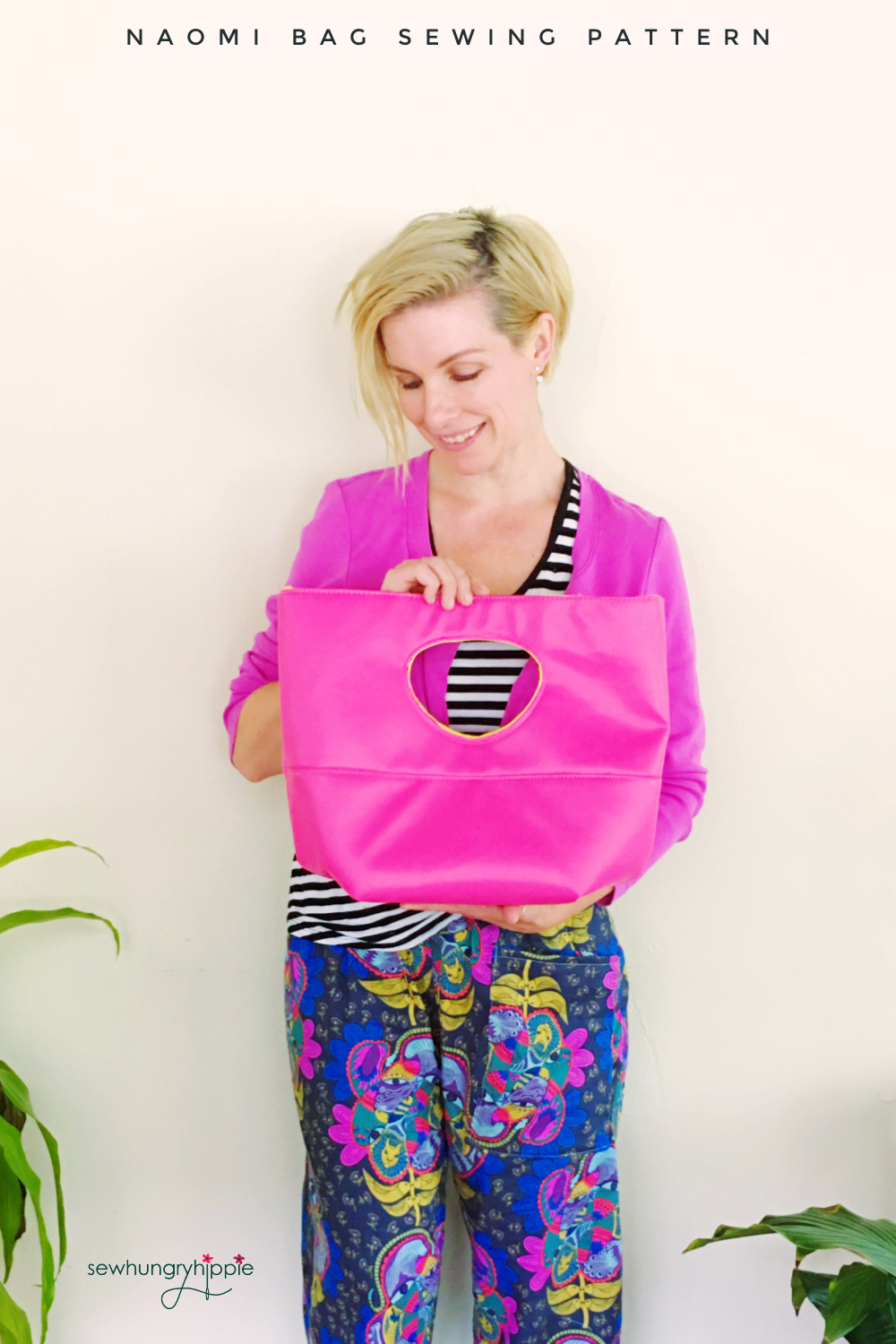Naomi bag sewing pattern held by a woman