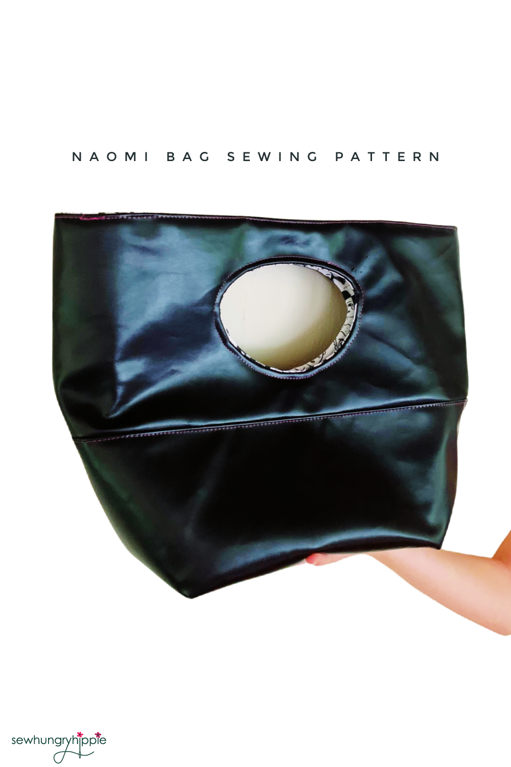 Black handbag with unique handle