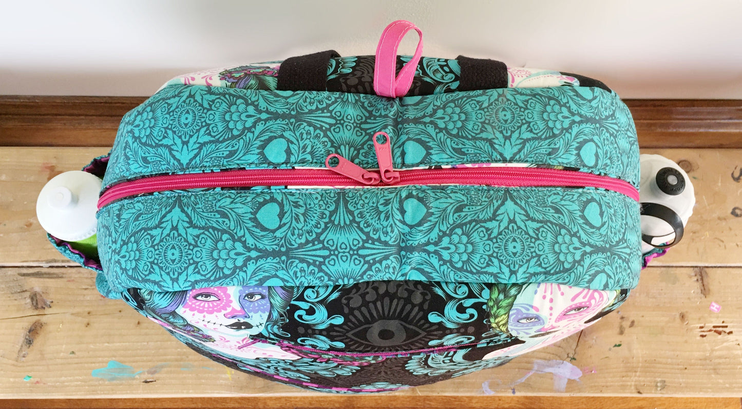 New Sew Hungry Hippie backpack with teal and pink details