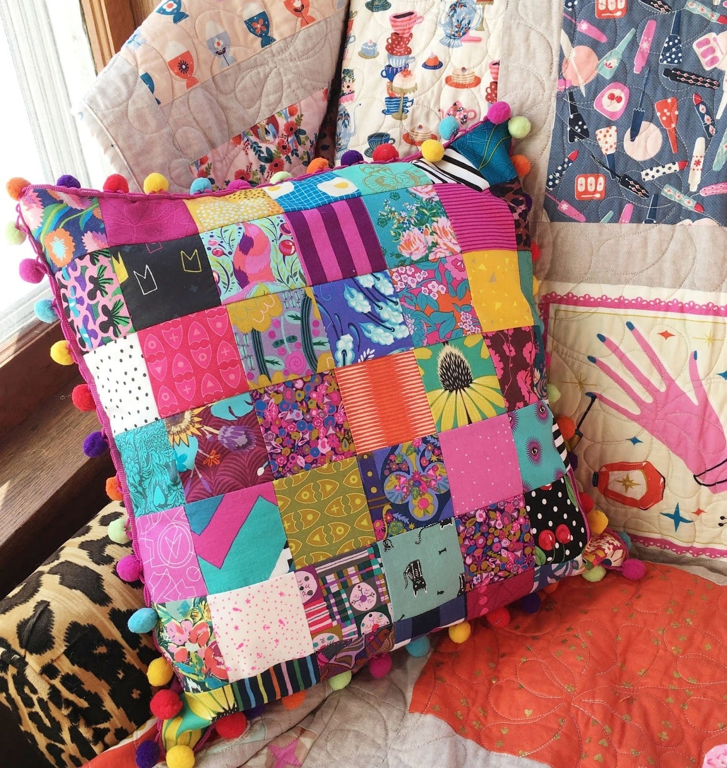 Patchwork pillow kit, colorful squares with pompom trim