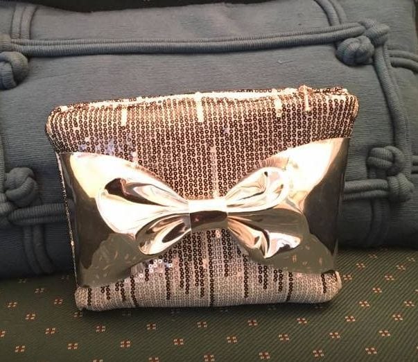 Rae sequin bow clutch