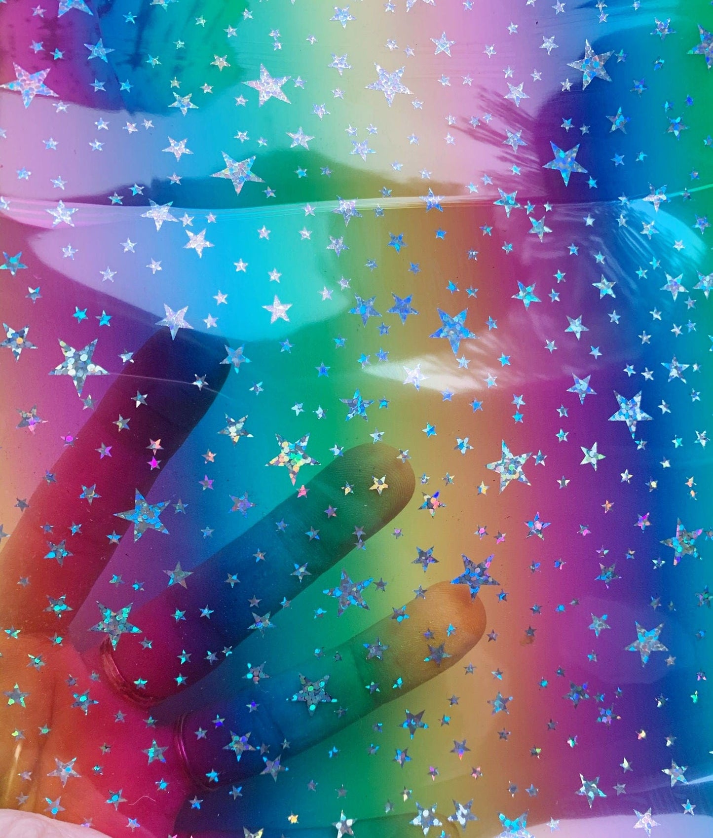 Rainbow stars seethrough overlay on rainbow background