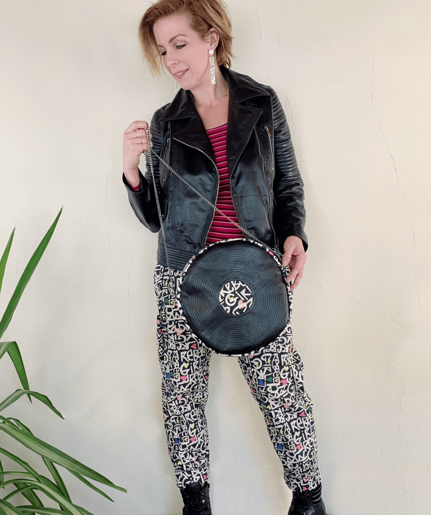 Woman holding record LP purse
