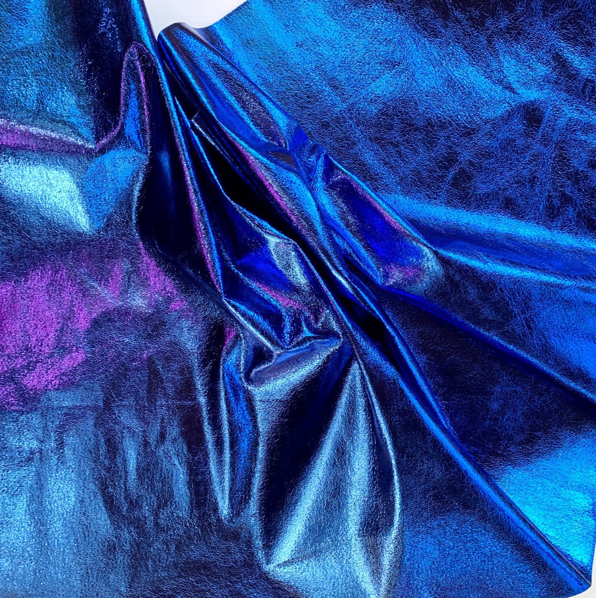 Soft blue vinyl fabric with shimmering folds