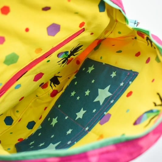 Wanda's colorful bag interior with stars and bugs.