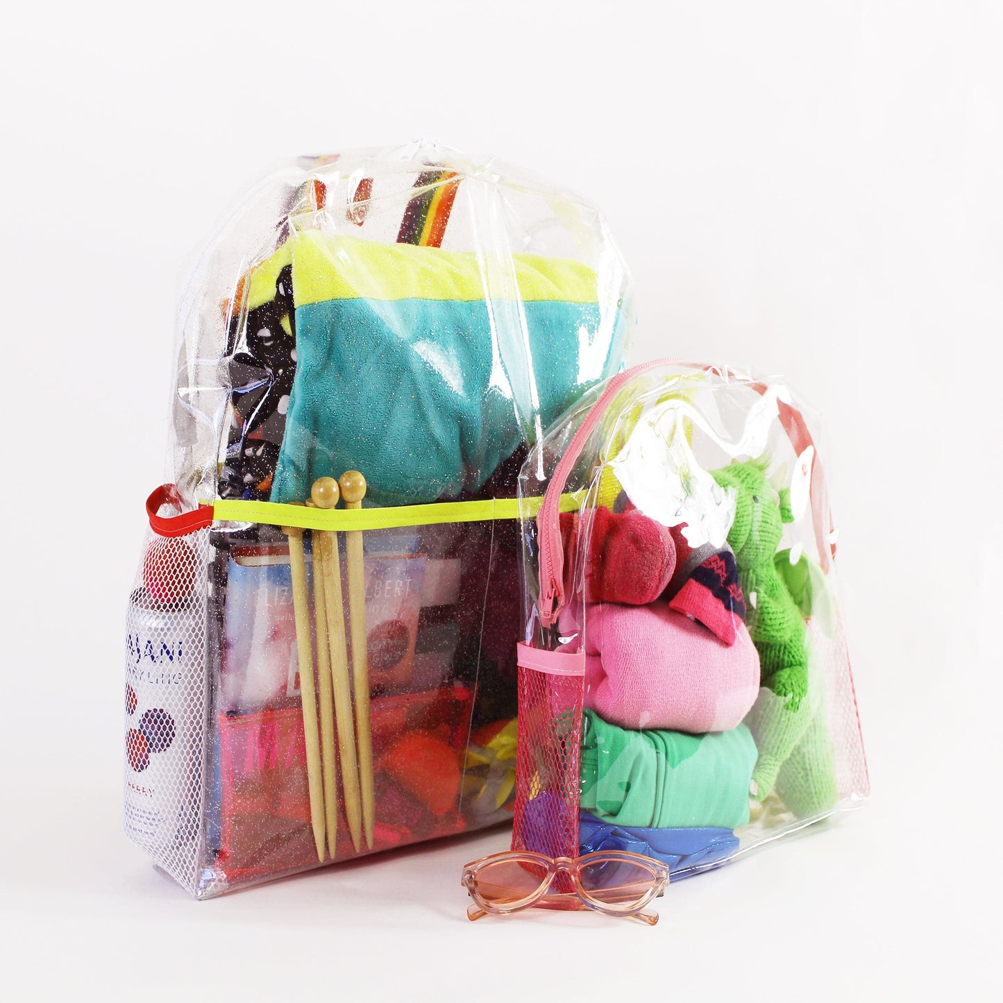Wendy backpacks, clear beach bags filled with essentials