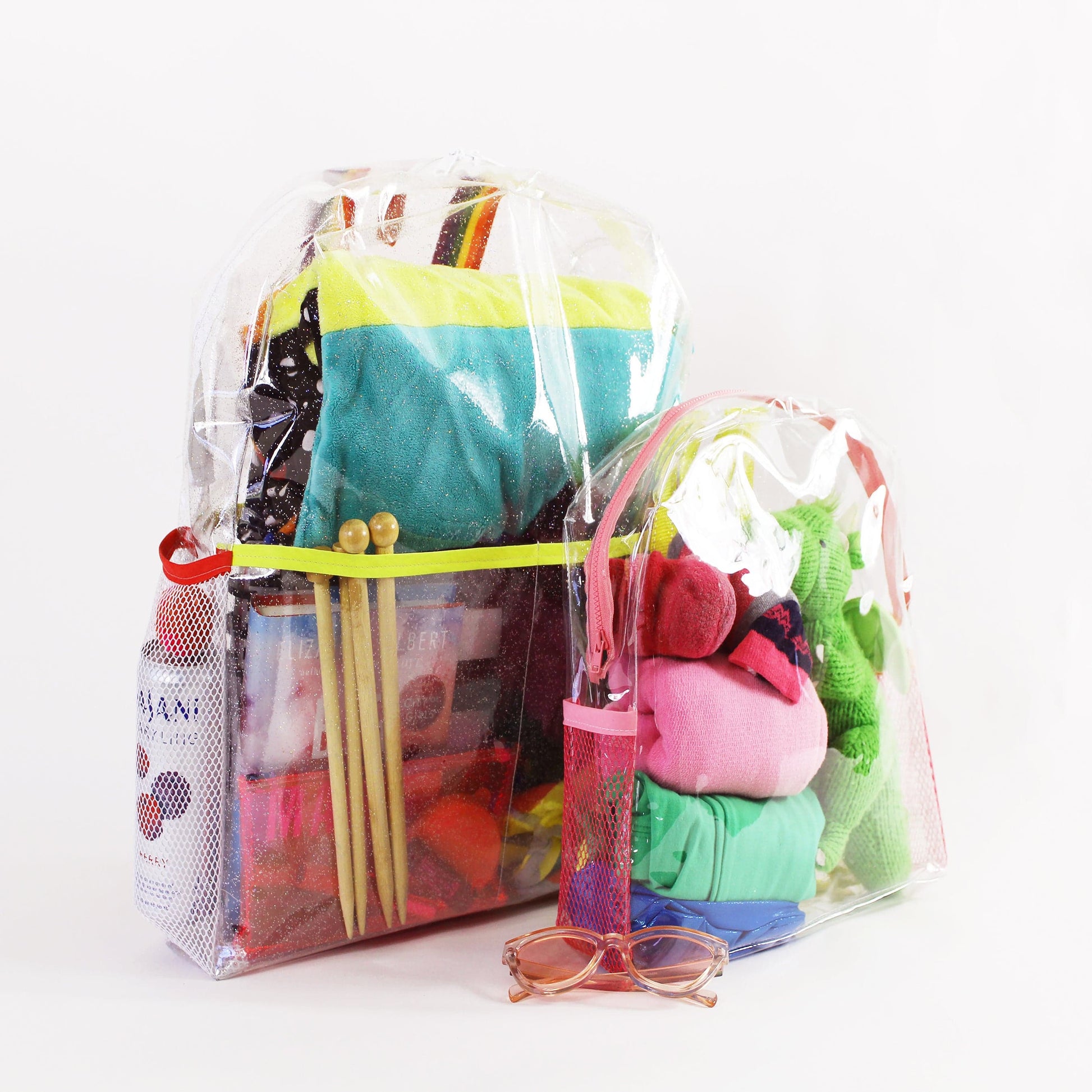 Wendy backpacks, clear beach bags filled with essentials